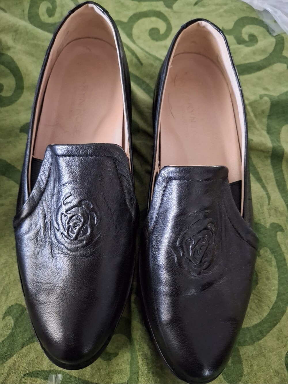 Taryn Rose Black Leather Rose-Embossed Slip-On Loafers